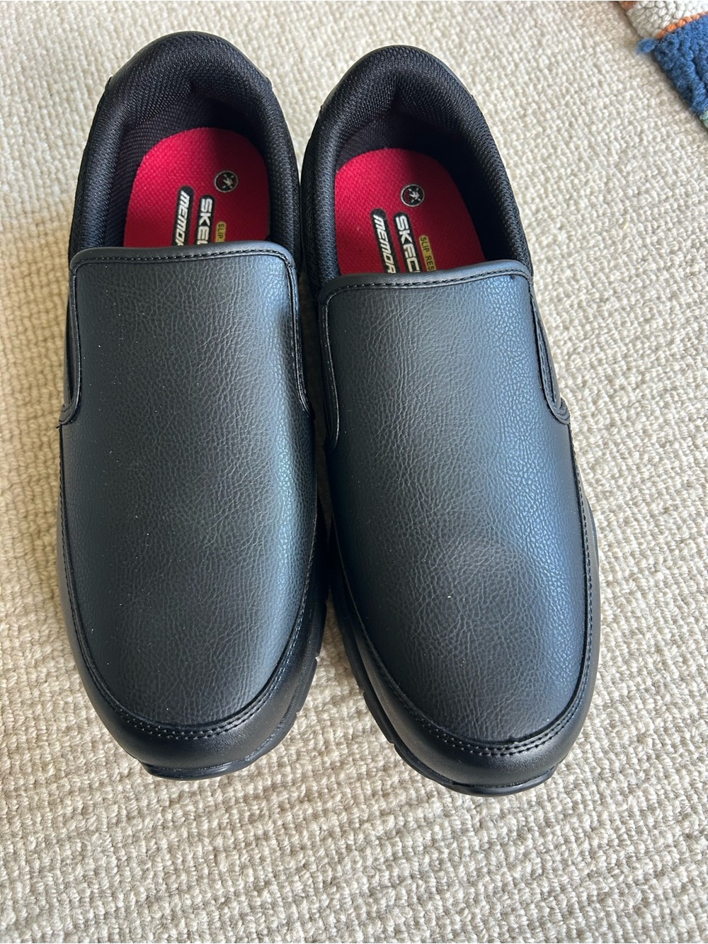 Skechers Black Slip-On Work Loafers with Red Insole